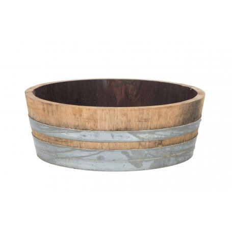 Tammisen Viinitynnyrin 65 cm puolikkaita. Hyvä istutusastia tai vaikka vesiaihe. Lintujen juoma-allas, kylpyallas.